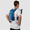 Man wearing Ultimate Direction Mountain Vest 5.0, rear view