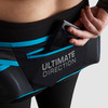 Woman removing phone from Ultimate Direction Hydrolight Belt