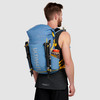 Man wearing Ultimate Direction Fastpack 30, rear view