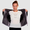 Woman wearing Ultimate Direction Women's Ventro Jacket, front view, with jacket unzipped