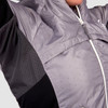Close up of Man wearing Ultimate Direction Men's Ventro Jacket, showing ventilation panel under arm