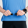 Man wearing Ultimate Direction Comfort Belt Plus, front view, bucking the waist belt