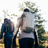 People carrying Ultimate Direction FastpackHer 20 on a hike