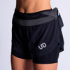 Woman wearing Ultimate Direction Women's Hydro Short, front view