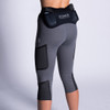 Woman wearing Ultimate Direction Women's Hydro 3/4 Tight, rear view