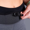 Close up of Woman wearing Ultimate Direction Women's Hydro Skin Short, showing adjustable nylon waist strap