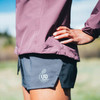 Woman wearing Ultimate Direction Women's Stratus Short