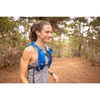Woman running with Ultimate Direction Trail Vest