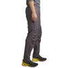 Man wearing Ultimate Direction Men's Ultra Pant V2, gray, side view
