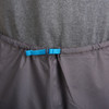 Close up of man wearing Ultimate Direction Men's Ultra Pant V2, showing adjustable nylon waist belt