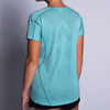 Woman wearing Ultimate Direction Women's Ultralight Tee, rear view