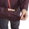 2nd close up of Woman wearing Women's Ultra Jacket V2, putting FlipMitt over hand