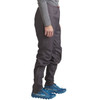 Woman wearing Ultimate Direction Women's Ultra Pant V2, gray, side view